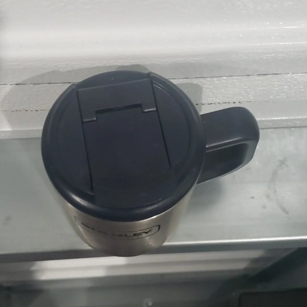 12 ounce‎ Stanley brand metal coffee cup with screw on lid
